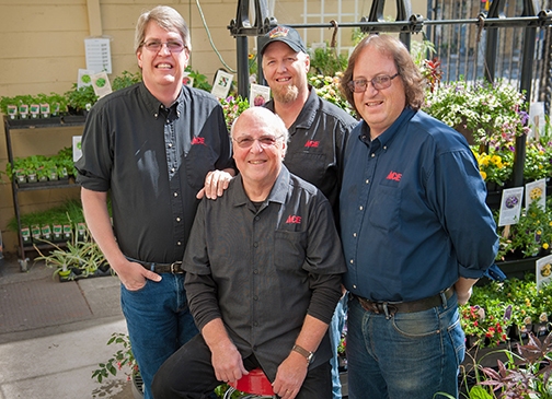 Brothers Russell, David and Tom Young with their father Chip Young (front).  