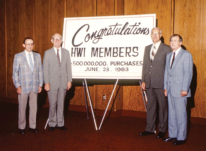 Do it Best President Focused on Driving Future Growth + 75 Years of Do it Best History 8 Don Wolf (second from right) congratulates HWI members on reaching $500 million in member purchases in 1983.