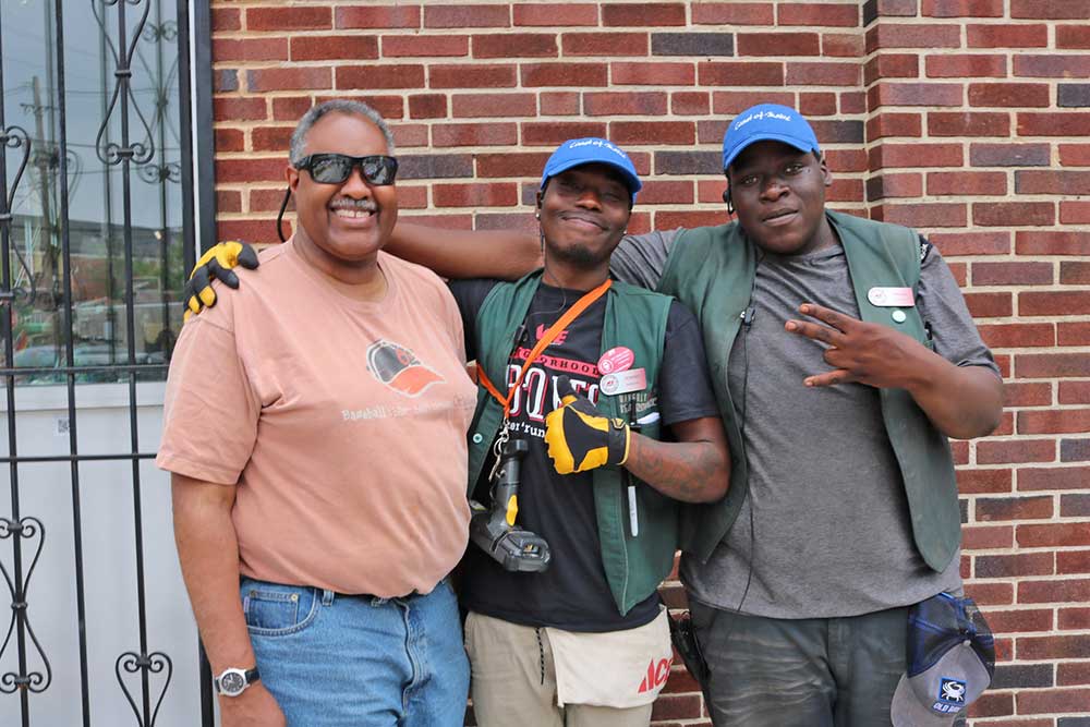 Striving Toward a More Diverse and Inclusive Industry 4 Dominic Robinson and Davon Betts with a customer at Waverly Ace in Baltimore.