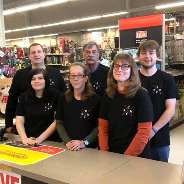 Executing a Dramatic Turnaround 3 Kent Schaper (back left) and his team have restored the community’s trust in the store.
