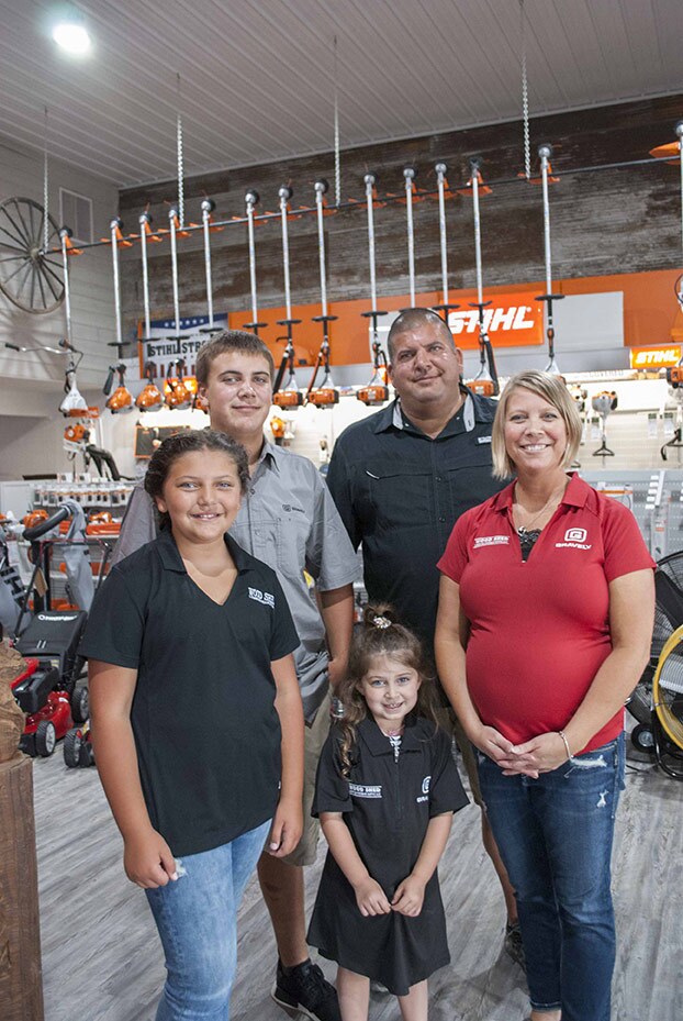 Beacon Award for Best New Store Under 20,000 sq. ft. — Wood Shed Lumber & Hardware Supply 1 Cecil and Sharona Eiserer are developing Wood Shed Lumber & Hardware into a strong, sustainable business that can someday be passed on to their kids (from l to r): Cicily, Porter and Novah.