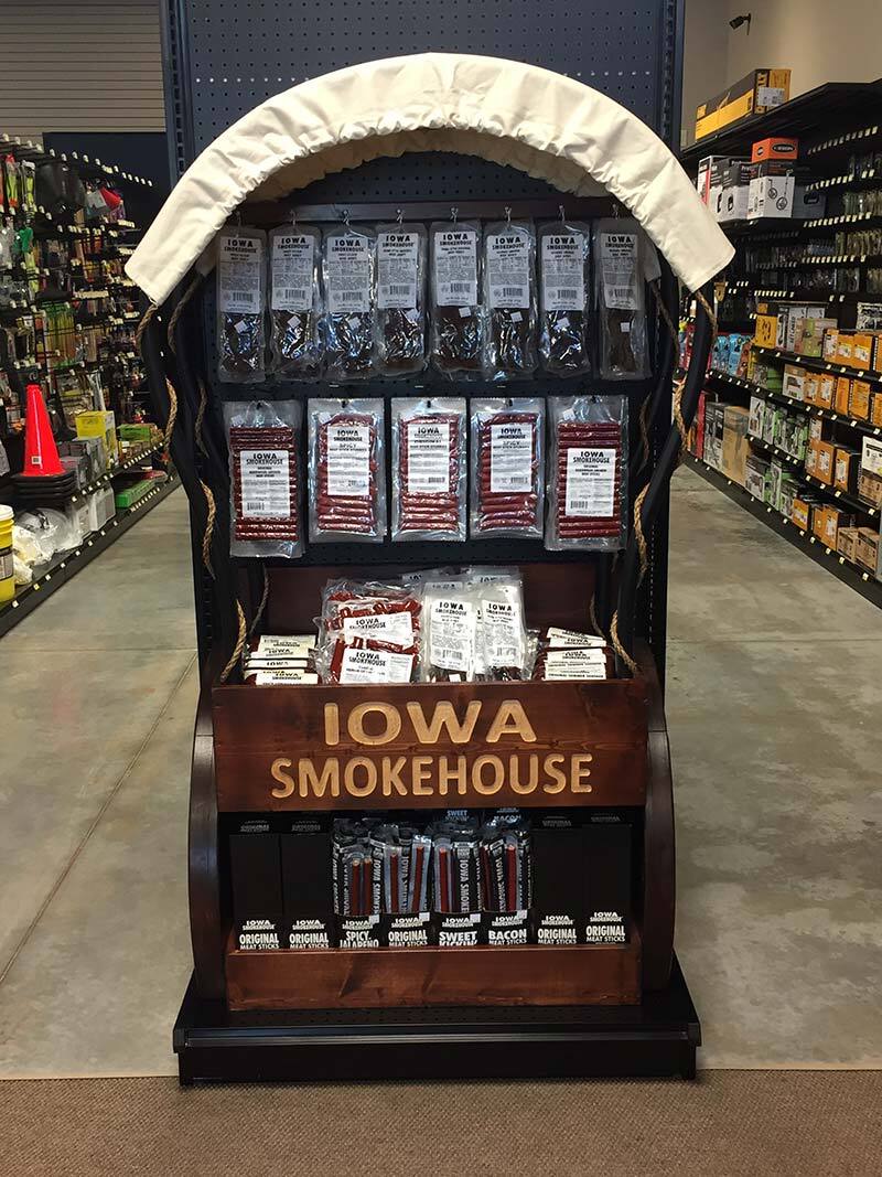 They create end caps from scratch, such as a three-foot covered wagon end cap for Iowa Smokehouse jerky.