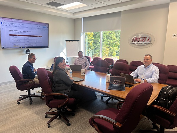 As a leader, Rivas believes in mentoring. His team, left to right: Adam Cusumano, Unilog EVP of product and marketing; Nancy Brincheiro, Unilog program manager; Grant Morrow, Orgill ecommerce director; Rivas.