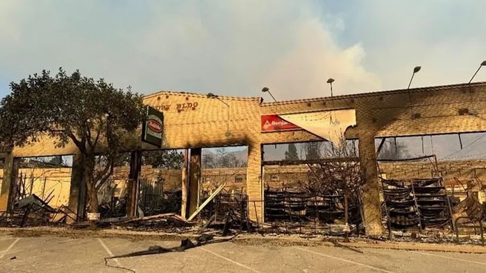 The blaze left only the store’s brick façade standing, destroying everything inside and resulting in a total loss of inventory and equipment.