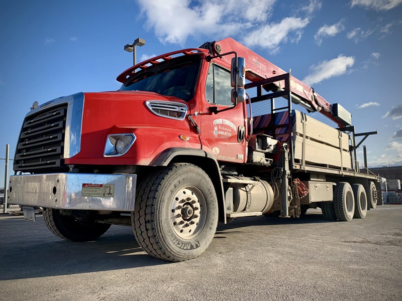Shaped by the Current 5 A Power Townsend delivery truck loaded with lumber heads out to a job site of one of the companyโs network of about 4,000 active contractor accounts.