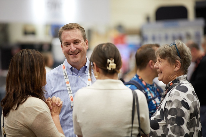 Starr on show floor Bigger, Stronger, Faster: Do it Best and True Value Host First Joint Spring Market in Orlando