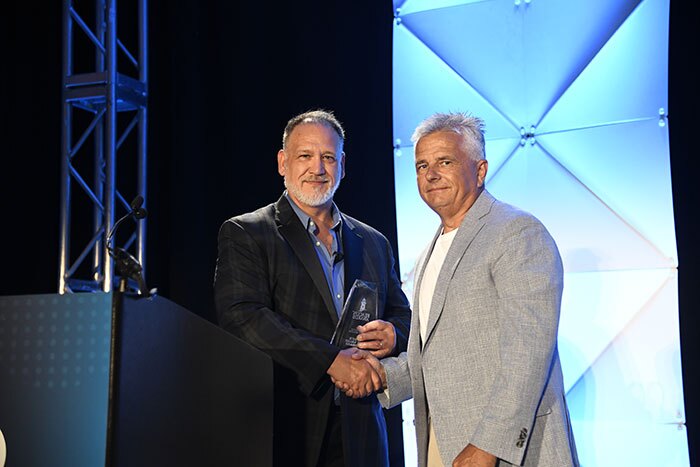 Peter Accepting award Legacy of Leadership & Service — Peter’s True Value Hardware Wins Retail Beacon Award 
