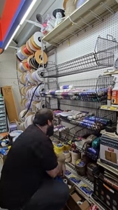 Retailer2Retailer: The Hardware Store Is the Star 3 Ben putting up display Retailer2Retailer: The Hardware Store Is the Star