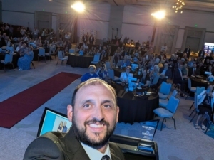 Posing With Purpose - 2026 Digital Beacon Awards 2 Ambridge 1 IHI podium selfie Posing With Purpose - 2026 Digital Beacon Awards